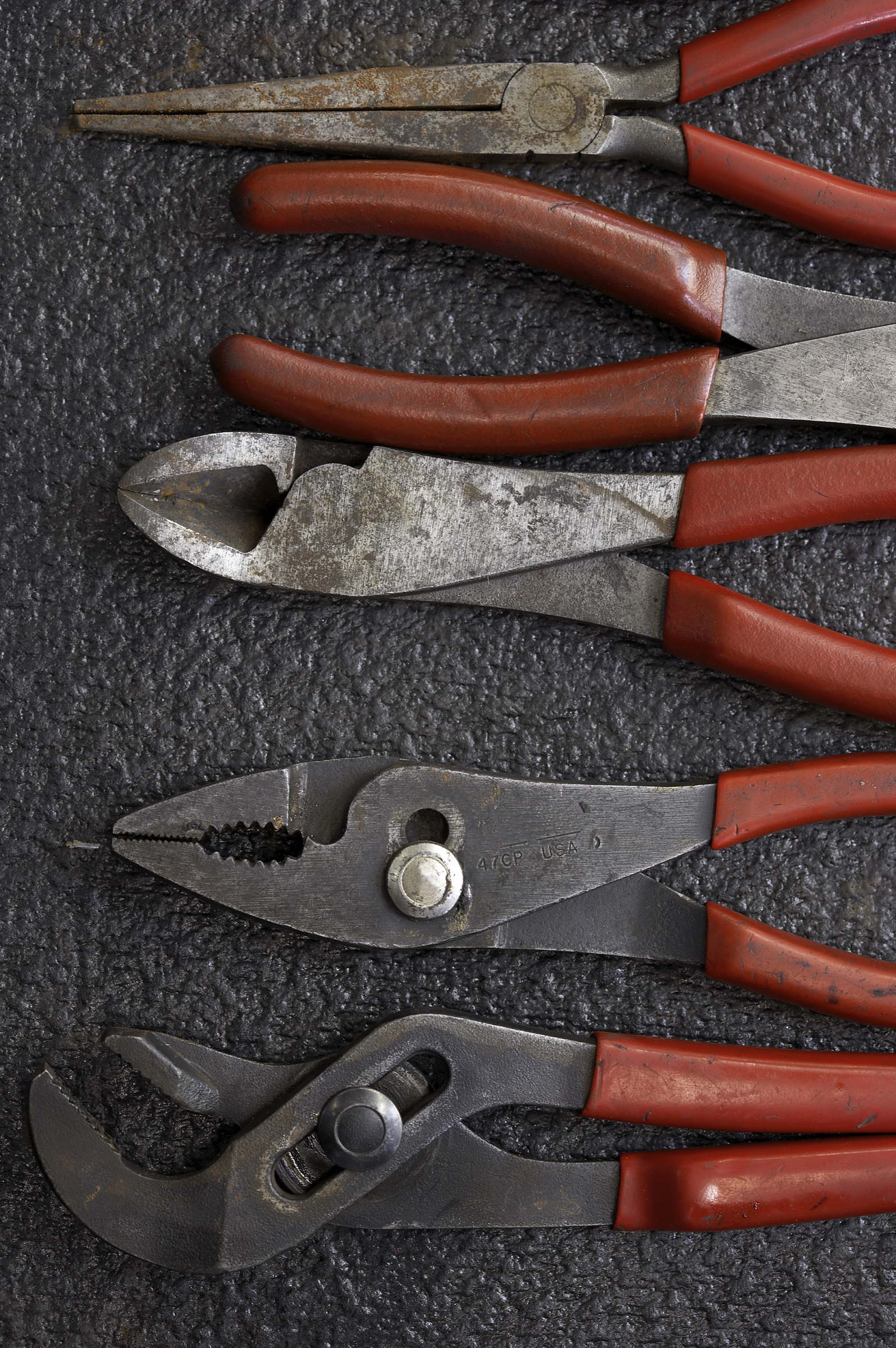 various tools such as pliers and clamps
